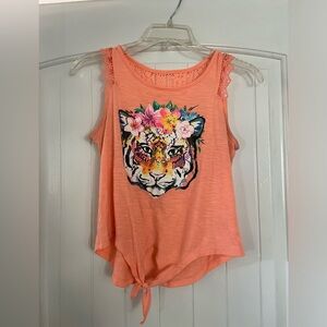 Orange top with a tiger on it